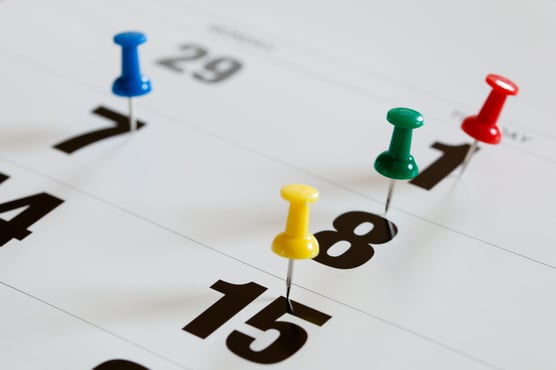 pushpins-on-calendar